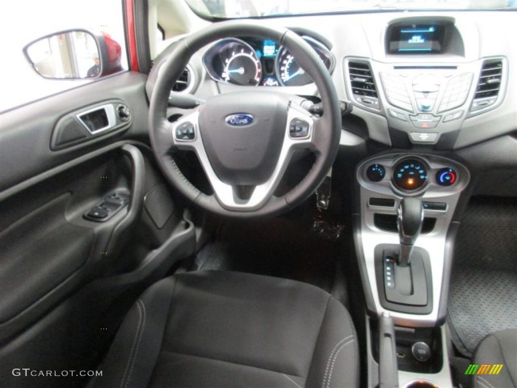 2016 Fiesta SE Sedan - Ruby Red Metallic / Charcoal Black photo #11