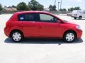 2009 Red Alert Nissan Versa 1.8 S Hatchback  photo #2