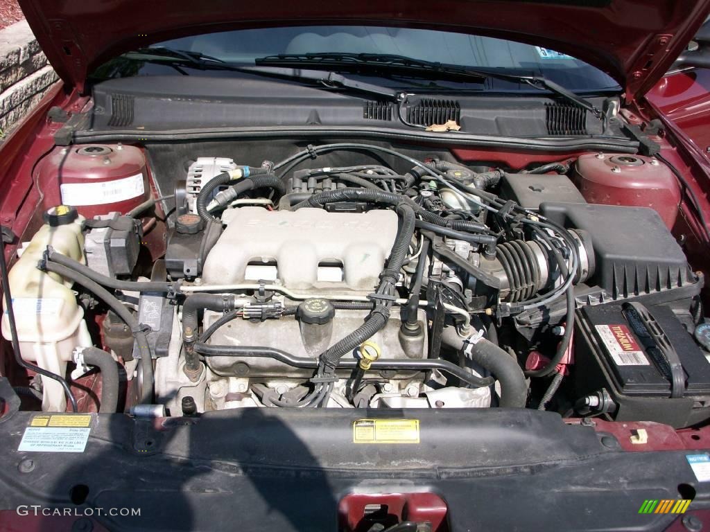 2001 Grand Am SE Sedan - Redfire Metallic / Dark Pewter photo #25