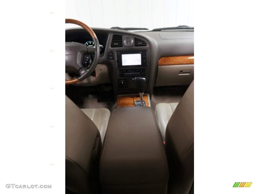 2001 QX4 4x4 - Tuscan Beige Metallic / Stone Beige photo #29