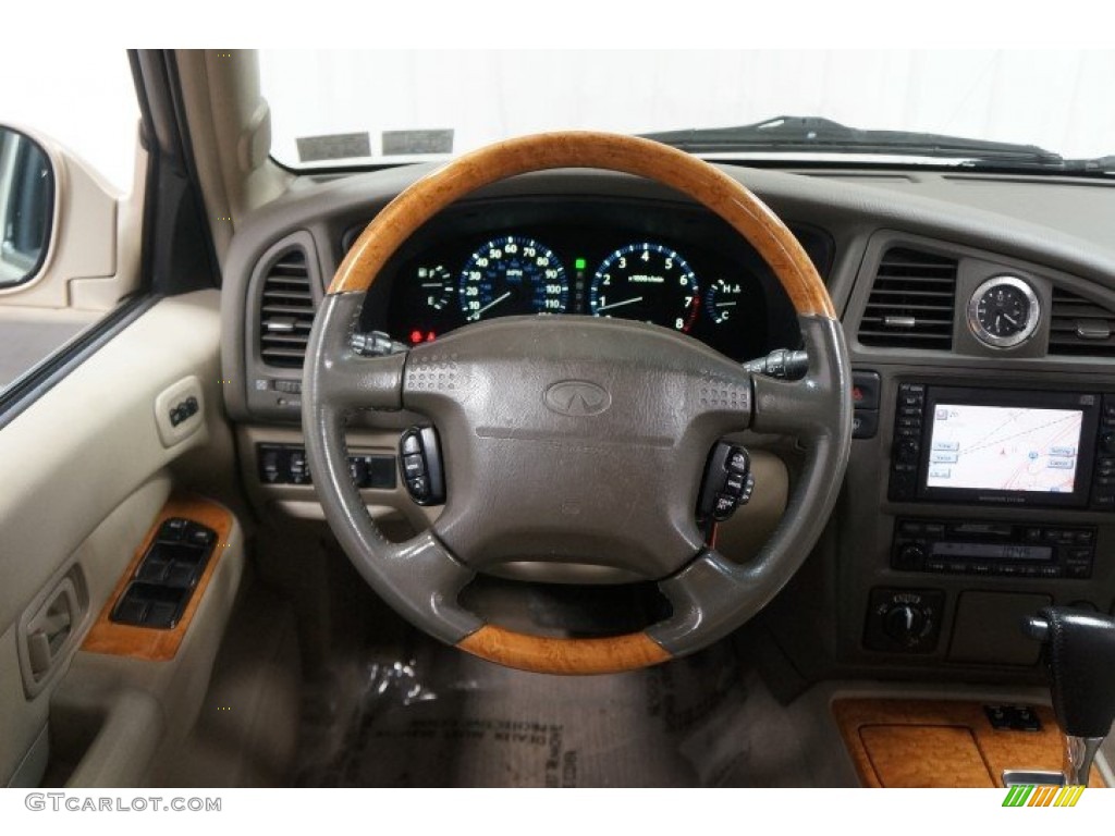 2001 QX4 4x4 - Tuscan Beige Metallic / Stone Beige photo #30