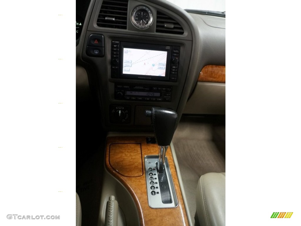 2001 QX4 4x4 - Tuscan Beige Metallic / Stone Beige photo #39