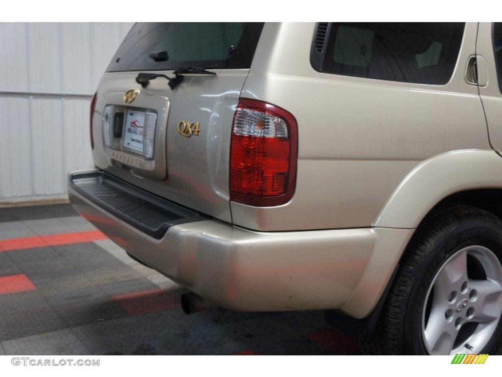 2001 QX4 4x4 - Tuscan Beige Metallic / Stone Beige photo #77