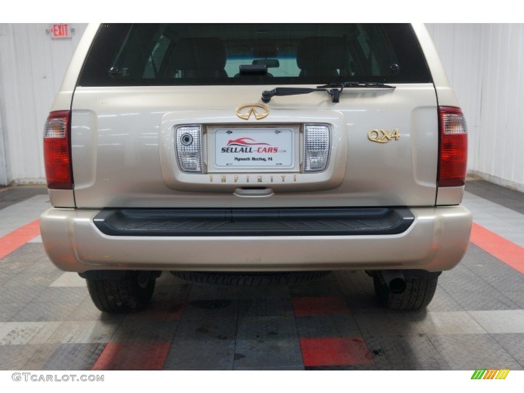 2001 QX4 4x4 - Tuscan Beige Metallic / Stone Beige photo #78