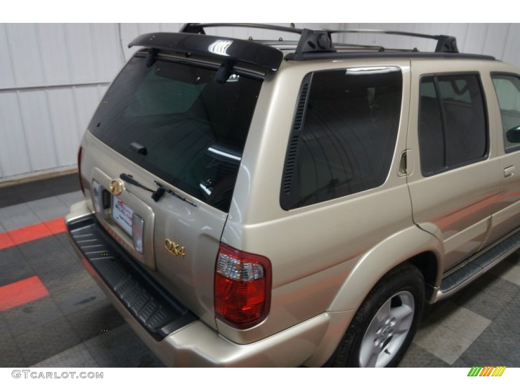 2001 QX4 4x4 - Tuscan Beige Metallic / Stone Beige photo #96