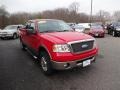 2006 Bright Red Ford F150 Lariat SuperCab 4x4  photo #1