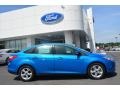 2014 Blue Candy Ford Focus SE Sedan  photo #2