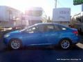 2015 Blue Candy Metallic Ford Focus SE Sedan  photo #2