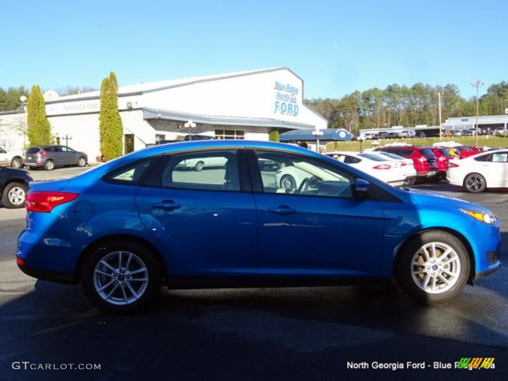 2015 Focus SE Sedan - Blue Candy Metallic / Medium Light Stone photo #6