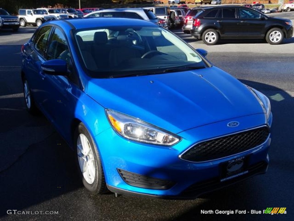 2015 Focus SE Sedan - Blue Candy Metallic / Medium Light Stone photo #7