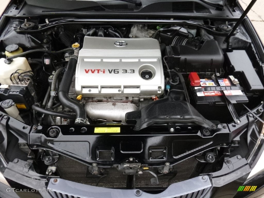 2006 Solara SLE V6 Convertible - Black / Ivory photo #16