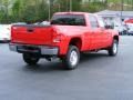 2009 Fire Red GMC Sierra 2500HD SLT Crew Cab 4x4  photo #4