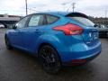 2016 Blue Candy Ford Focus SE Hatch  photo #5