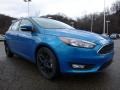 2016 Blue Candy Ford Focus SE Hatch  photo #9