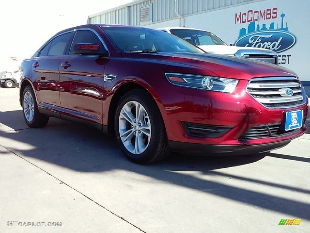 2015 Taurus SEL - Ruby Red Metallic / Dune photo #1