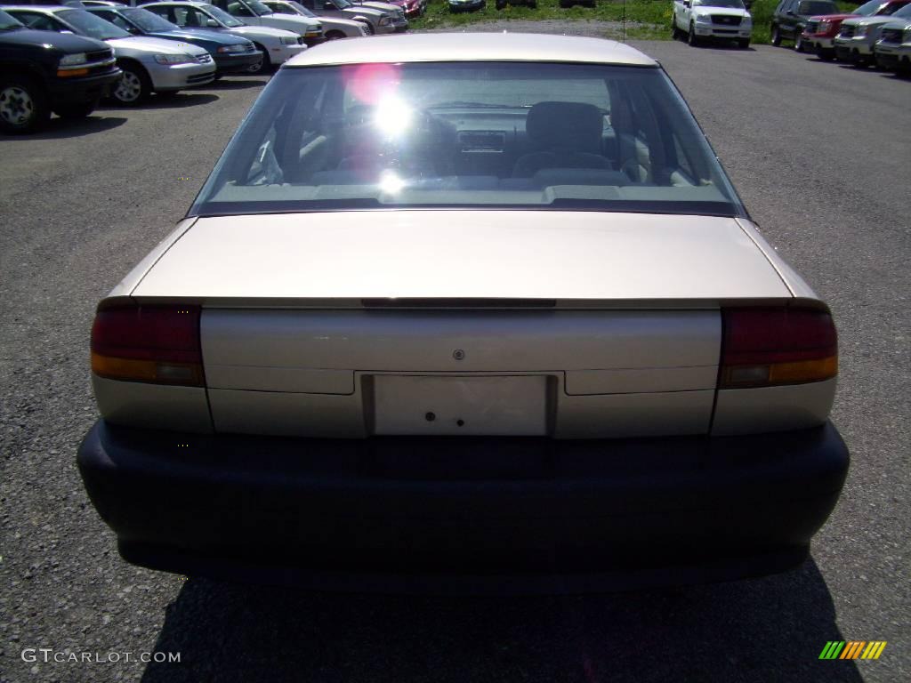 1994 S Series SL1 Sedan - Gold / Tan photo #4