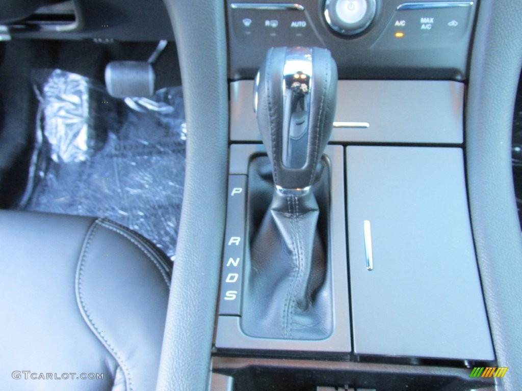2015 Taurus SEL - Magnetic Metallic / Charcoal Black photo #28