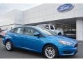 2016 Blue Candy Ford Focus SE Sedan  photo #1