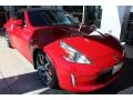 2013 Solid Red Nissan 370Z Touring Roadster  photo #2