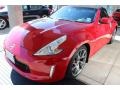 2013 Solid Red Nissan 370Z Touring Roadster  photo #3