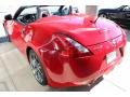 2013 Solid Red Nissan 370Z Touring Roadster  photo #13