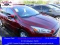 2016 Ruby Red Ford Focus SE Sedan  photo #1