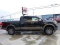  2016 TITAN XD Platinum Reserve Crew Cab 4x4 Magnetic Black