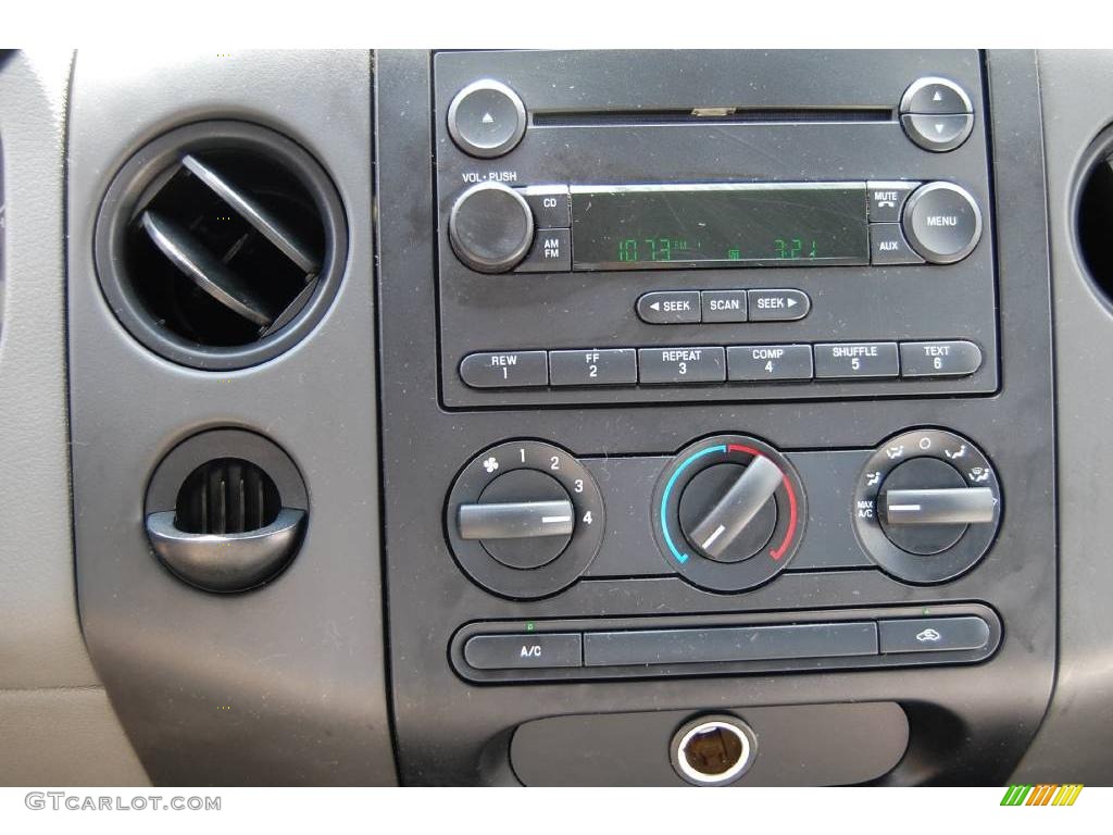 2004 F150 STX Regular Cab - Bright Red / Dark Flint photo #22