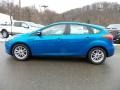 2016 Blue Candy Ford Focus SE Hatch  photo #1