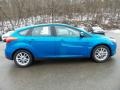 2016 Blue Candy Ford Focus SE Hatch  photo #4