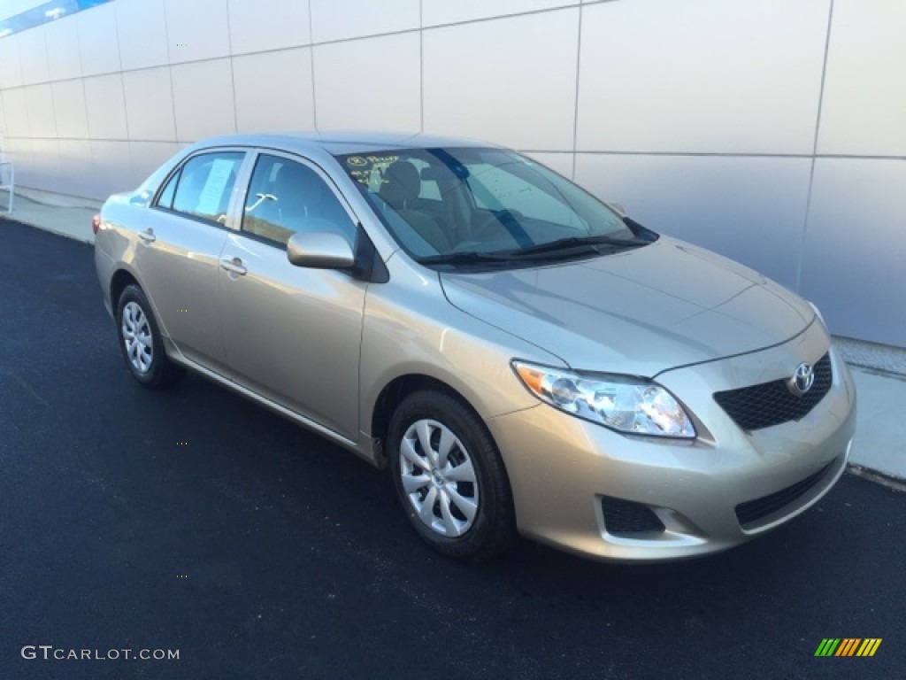 2010 Corolla LE - Desert Sand Metallic / Bisque photo #1