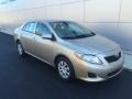2010 Desert Sand Metallic Toyota Corolla LE #110494949