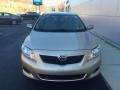 2010 Desert Sand Metallic Toyota Corolla LE  photo #3