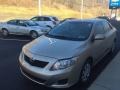 2010 Desert Sand Metallic Toyota Corolla LE  photo #4