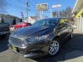 2016 Magnetic Metallic Ford Fusion SE  photo #1