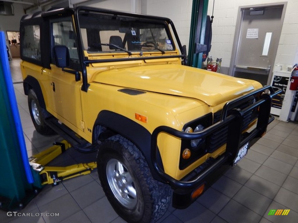 Yellow Land Rover Defender