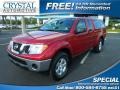 2010 Red Brick Nissan Frontier SE V6 King Cab 4x4  photo #1