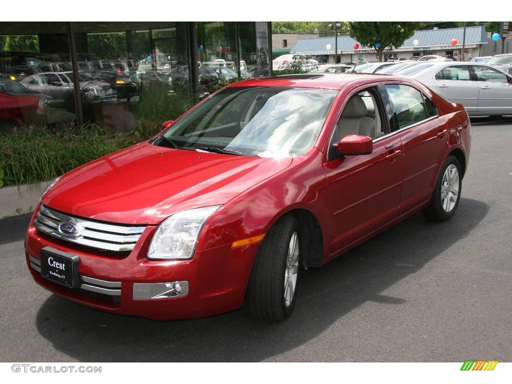 2009 Fusion SEL V6 - Redfire Metallic / Medium Light Stone photo #1