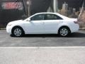 Super White - Camry LE Photo No. 1