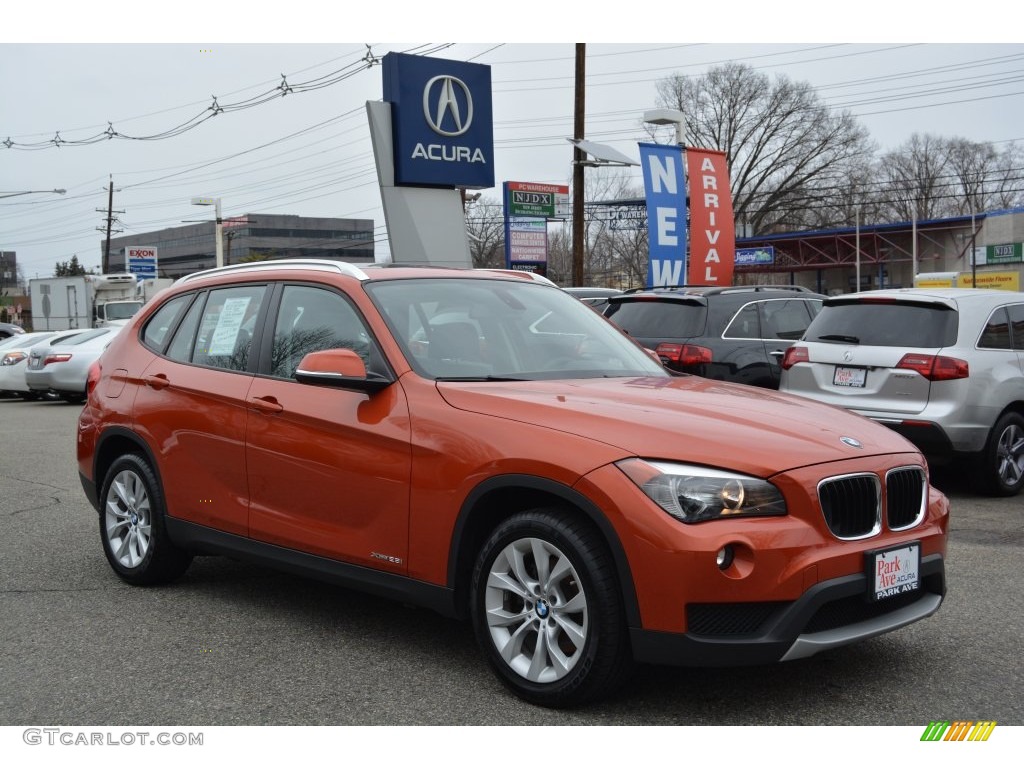 2013 X1 xDrive 28i - Valencia Orange / Black photo #1