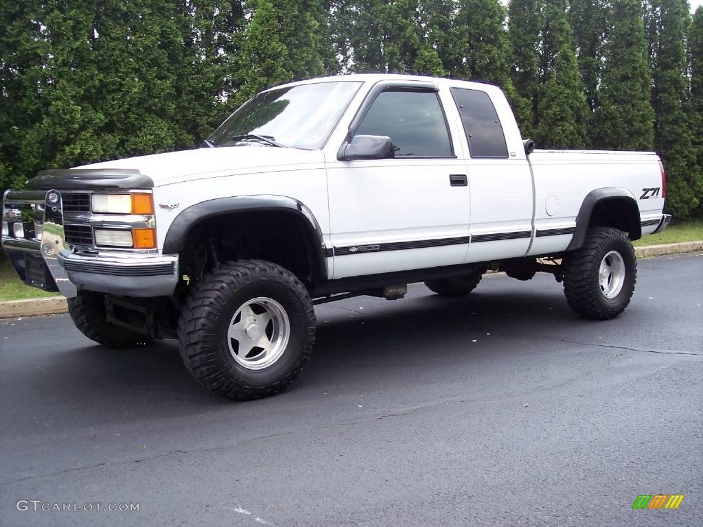 1997 C/K K1500 Silverado Extended Cab 4x4 - Olympic White / Red photo #1