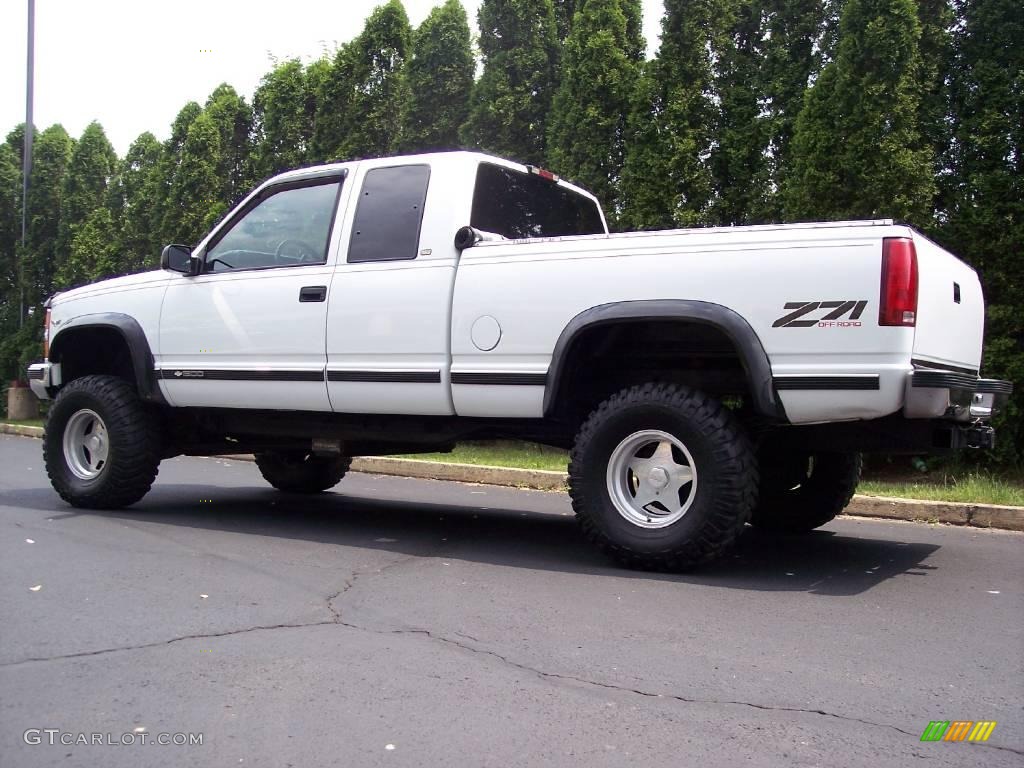1997 C/K K1500 Silverado Extended Cab 4x4 - Olympic White / Red photo #11