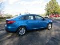 2016 Blue Candy Ford Focus SE Sedan  photo #3