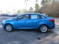 2016 Blue Candy Ford Focus SE Sedan  photo #7