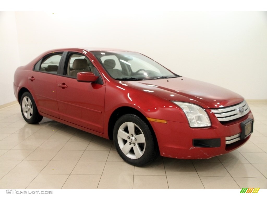 2006 Fusion SE V6 - Redfire Metallic / Medium Light Stone photo #1