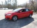 2016 Race Red Ford Focus SE Sedan  photo #7