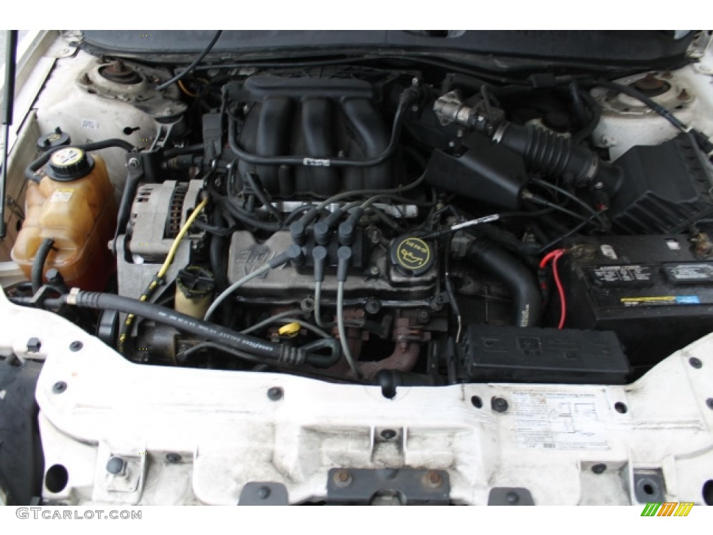 2004 Taurus SE Sedan - Vibrant White / Medium Graphite photo #7