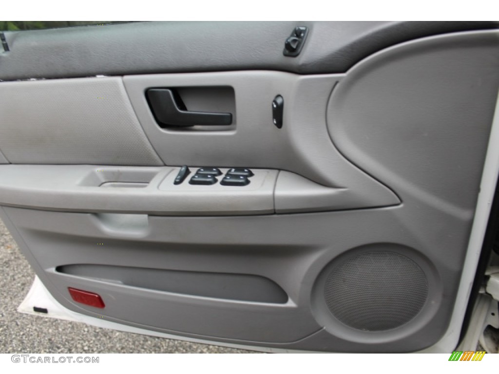 2004 Taurus SE Sedan - Vibrant White / Medium Graphite photo #15