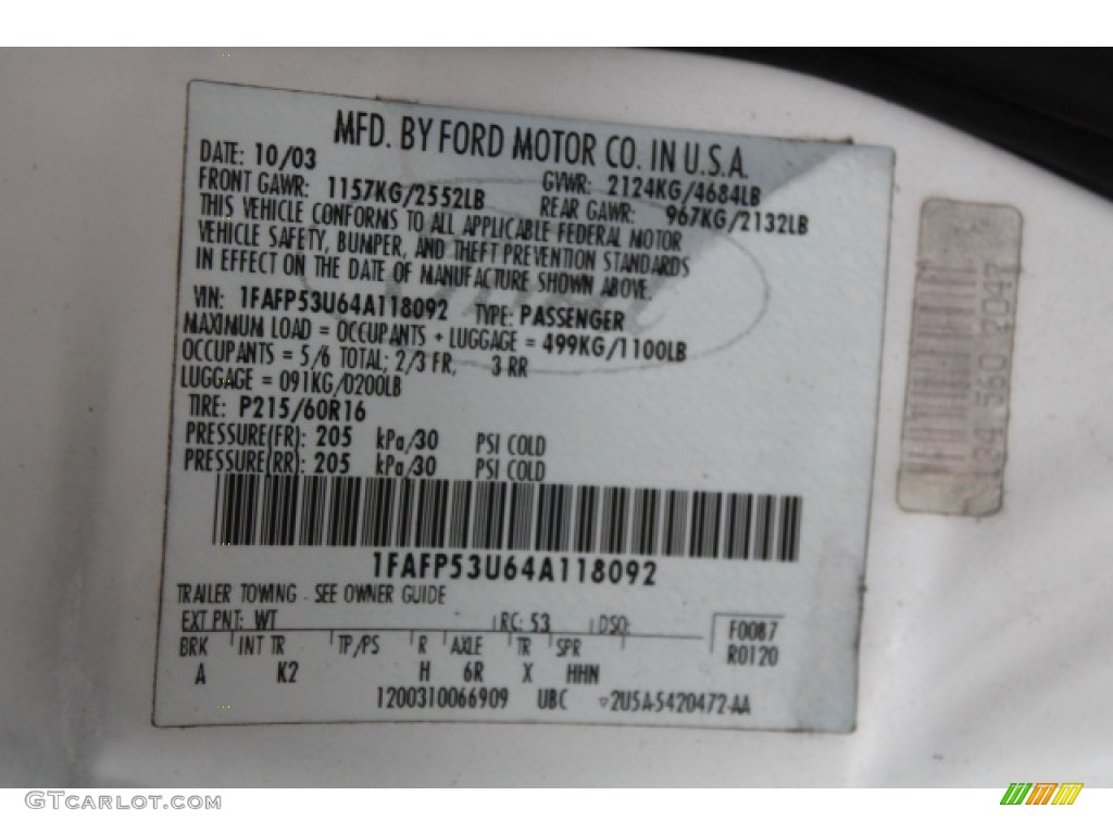 2004 Taurus SE Sedan - Vibrant White / Medium Graphite photo #17