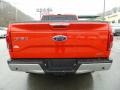 2016 Race Red Ford F150 Lariat SuperCab 4x4  photo #7